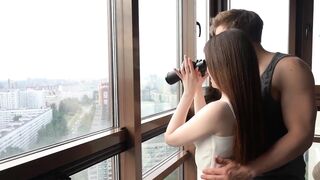 The Hot Bodies of a Young Couple Joined in Sexy Passionate Sex on a Balcony Overlooking the City
