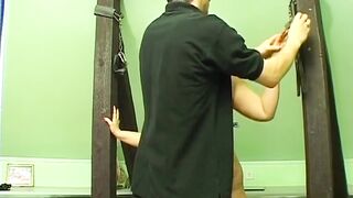 Tied Redhead MILF Endures Clamps and Flogger Play