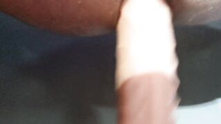 Closeup 14 inch dildo anal pounding with exercise machine