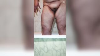 BBW MILF mamma peeing in the shower in slow motion