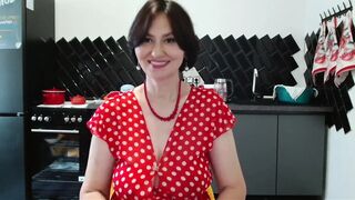 her polka-dot costume spread to the sides
