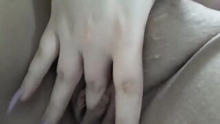 Spreading pussy with long nails