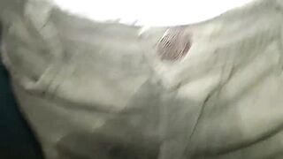 Pants soiled with a cloth diaper