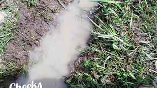 Bare feet in mud