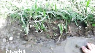 Bare feet in mud