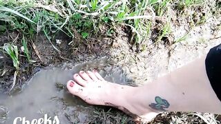 Bare feet in mud