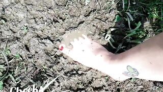 Bare feet in mud