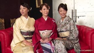Passionate individuals of Asian descent engage in gangbangual activities while wearing traditional kimonos, culminating in prof