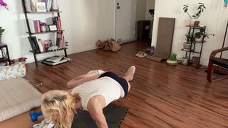 Sweaty white tank top golden-haired fit playgirl ab workout