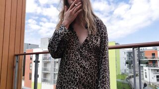 Smokin' on the balcony in my leopard PJs