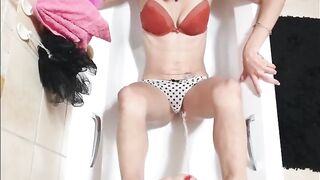 Pissing on slim bitch in her underclothes as this hottie holds my schlong with her feet
