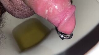 Nasty big pierced jock peeing