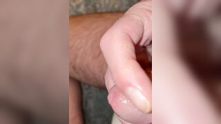Heavy breathing whilst I play with my cockhead and spread precum all over my tip as I edge, so close to cumming but I deny myself