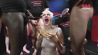 Tattooed Wench Gulps Piss and Schlongs in Extreme Ggg Bukkake
