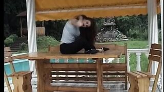 Gorgeous brunette masturbates outdoors
