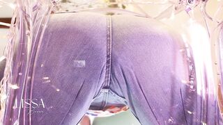Slim girl with a big butt bounces, inflating her curves with her jeans and micro bikini
