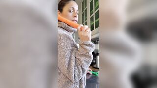 Angelina is cooking with carrots and this sweetheart can't assist treating 'em with her special spice.
