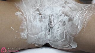Extreme closeup of hairy constricted twat shaving!