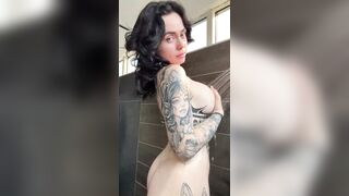 Tattooed ass shakes under hot shower spray