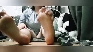 Trans boy lubes up his feet