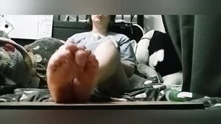 Trans boy lubes up his feet