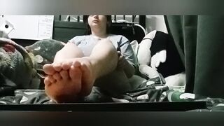 Trans boy lubes up his feet