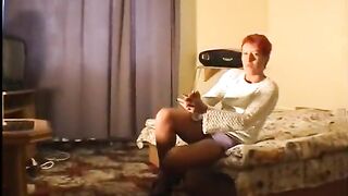 Great looking redhead screwing her snatch with fingers