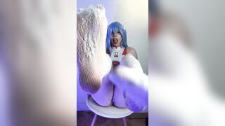 Thick thighs spread wide on the chair