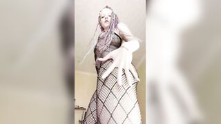 Thick legs spread wide in fishnet hosiery ?