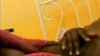 Ebony wench tastes a dildo after getting it slipped in her cunt
