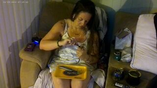 Busty angel in pink bra and panties smokin' and playing movie scene games