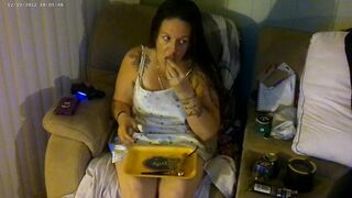 Busty angel in pink bra and panties smokin' and playing movie scene games