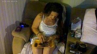 Busty angel in pink bra and panties smokin' and playing movie scene games
