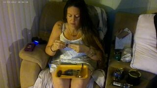 Busty angel in pink bra and panties smokin' and playing movie scene games