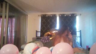 Extremely sexually excited hotty takes off her dress and smokes cigarettes and pops balloons undressed