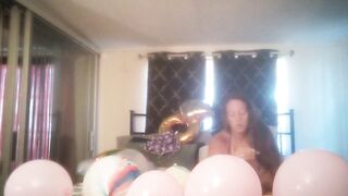 Extremely sexually excited hotty takes off her dress and smokes cigarettes and pops balloons undressed