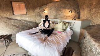 Masked Latex Screw Toy Masturbates in Africa
