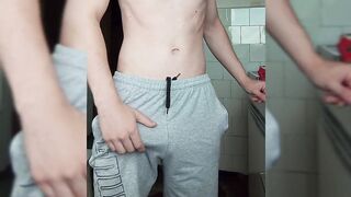 Corpulent ramrod in gray shorts. Handjob in the kitchen while preparing breakfast