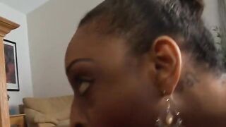 Beautiful black woman sucking a hard cock