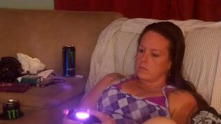 Filming up glamorous beauty's purple mini skirt while this playgirl's playing movie games (panty tease)