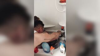 Nice-looking girl gives kitten a bathroom