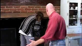 She pulls her legs back to give him a footjob