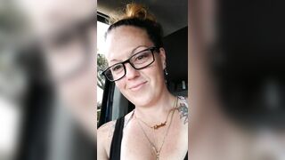 Girl films up her own black minidress and teases with her panties in public during the time that I'm driving