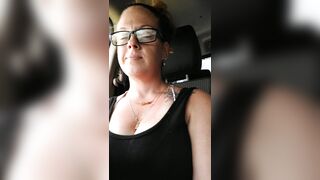Girl films up her own black minidress and teases with her panties in public during the time that I'm driving