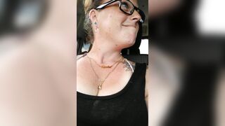 Girl films up her own black minidress and teases with her panties in public during the time that I'm driving
