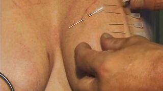 Redhead MILF Submits to Weighted Nipple Clamps