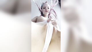 Pink haired hotty spreads legs wide open ?
