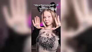Big breasts bounce as she teases with tongue ?