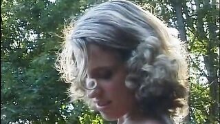Golden-haired thrall tied up in a street and humiliated with a sextoy