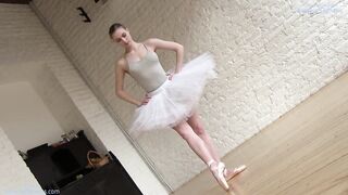 In nature's garb ballerina Annett A dances and her pumped up body shows wonders of flexibility and grace.